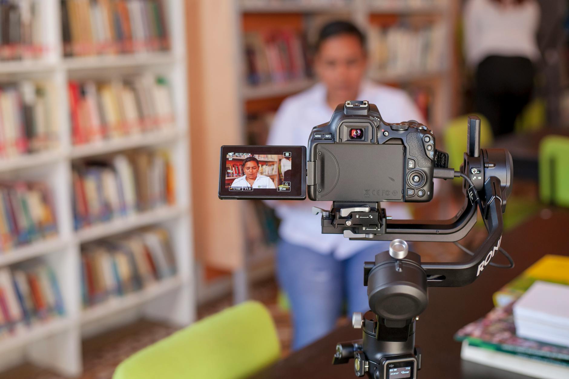 woman in front of a camera