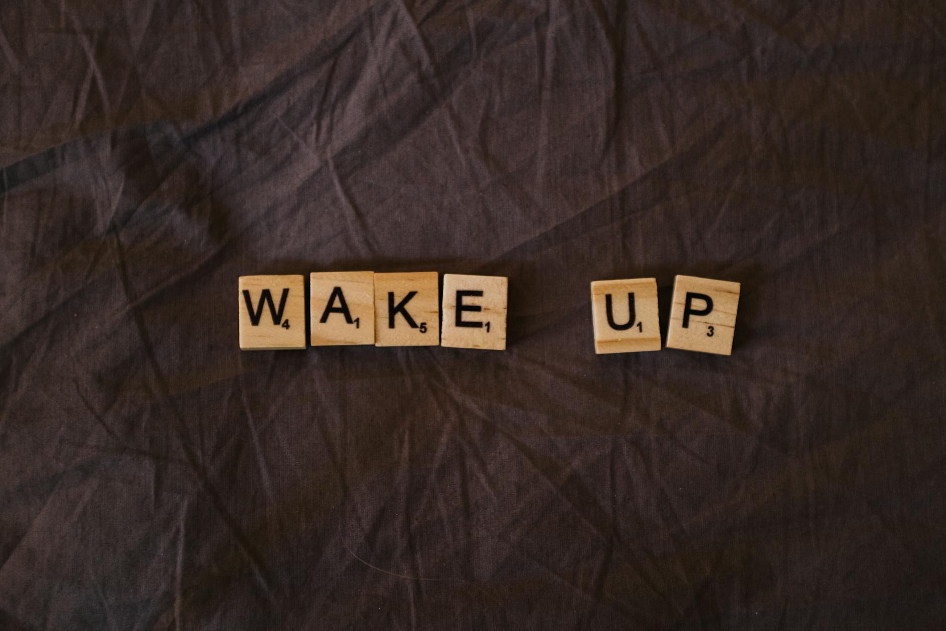 close up shot of scrabble tiles on a brown surface